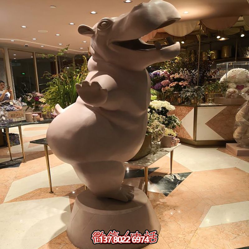 商場里播放的一只跳舞的玻璃鋼創意海馬雕塑 商場里播放的一只跳舞的玻璃鋼創意海馬雕塑